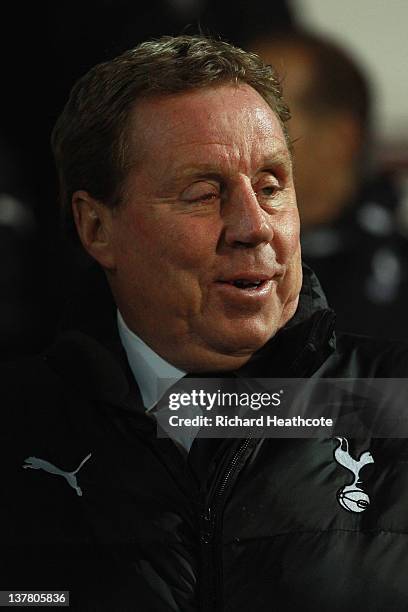 Manager Harry Redknapp of Spurs gestures during smiles during the FA Cup Fourth Round match between Watford and Tottenham Hotspur at Vicarage Road on...