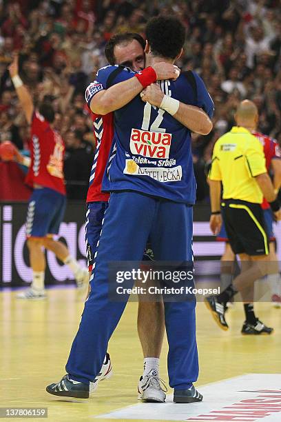 Alem Toskic and Darko Stanic of Serbia celebrate the 26-22 victory after the Men's European Handball Championship second semi final match between...