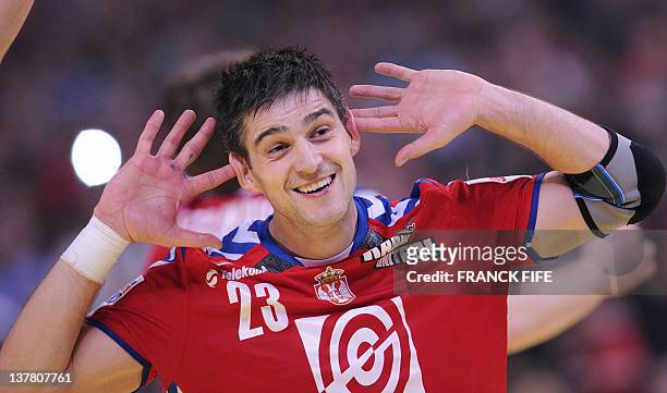 Serbia's Nenad Vuckovic celebrates after winning during the men's EHF Euro 2012 Handball Championship semifinal match Serbia vs Croatia on January...
