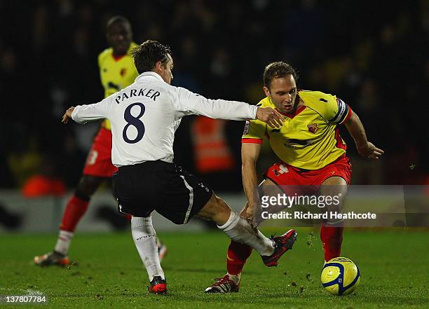 Scott Parker of Spurs and John Eustace of Watford fight for the ball during the FA Cup Fourth Round match between Watford and Tottenham Hotspur at...