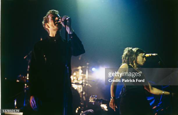 English trip hop group Massive Attack performing on stage, circa 1995.