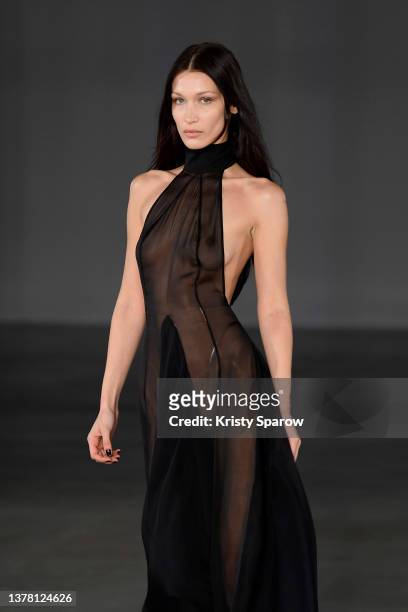 Bella Hadid walks the runway during the Ludovic De Saint-Sernin Womenswear Fall/Winter 2022-2023 show as part of Paris Fashion Week on March 03, 2022...