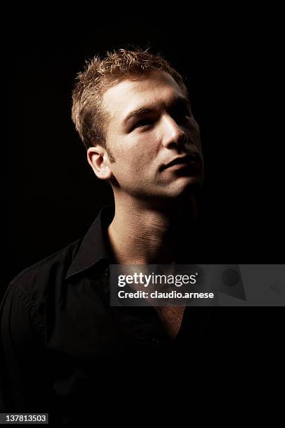 male beauty portrait with black background. color image - blonde hair black background stock pictures, royalty-free photos & images