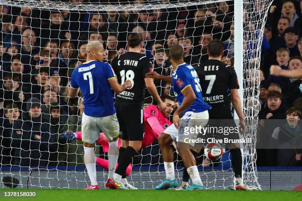 Taye Ashby-Hammond of Boreham Wood fails to save a header from Jose Salomon Rondon of Everton which leads to the second goal for Everton during the...