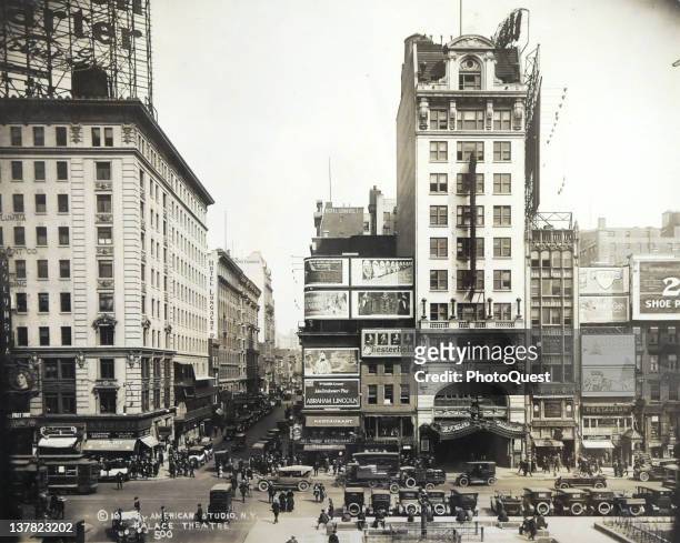 Street view of Broadway at the inersection with 47th Street, New York, early 1920. The tall building al left is B.F. Keith's Vaudeville at 1564...