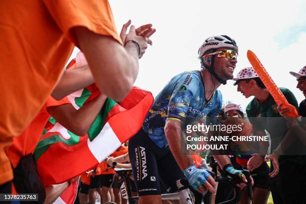 Astana Qazaqstan Team's British rider Mark Cavendish cycles in the Pike ascent during the 1st stage of the 110th edition of the Tour de France...