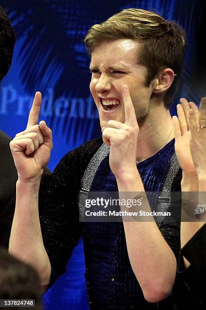 Jeremy Abbott, celebrates in the Kiss and Cry as he views his score after competing in the Senior Men's Short Program during the 2012 Prudential U.S....