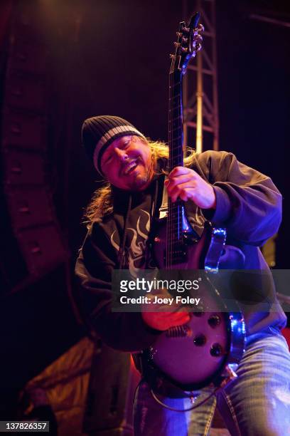 Guitarist Pete Evick of the Bret Michaels band performs onstage during day 1 of the Super Bowl Village on January 27, 2012 in Indianapolis, Indiana.