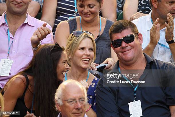James Packer and wife Erica Packer watch the women's final match between Maria Sharapova of Russia and Victoria Azarenka of Belarus during day...