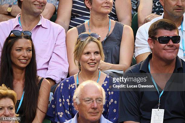 James Packer and wife Erica Packer watch the women's final match between Maria Sharapova of Russia and Victoria Azarenka of Belarus during day...