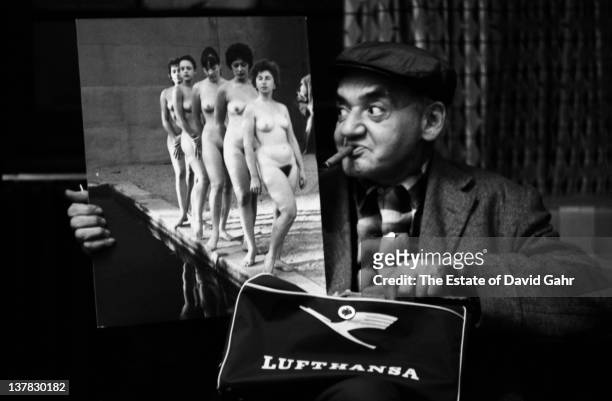 Polish born photojournalist Arthur Fellig , known as 'Weegee', poses for a portrait in November 1959 in New York City, New York.