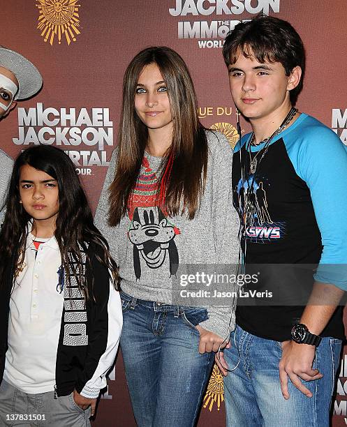 Blanket Jackson, Paris Jackson and Prince Michael Jackson attend the Los Angeles opening of "Michael Jackson THE IMMORTAL World Tour" at Staples...