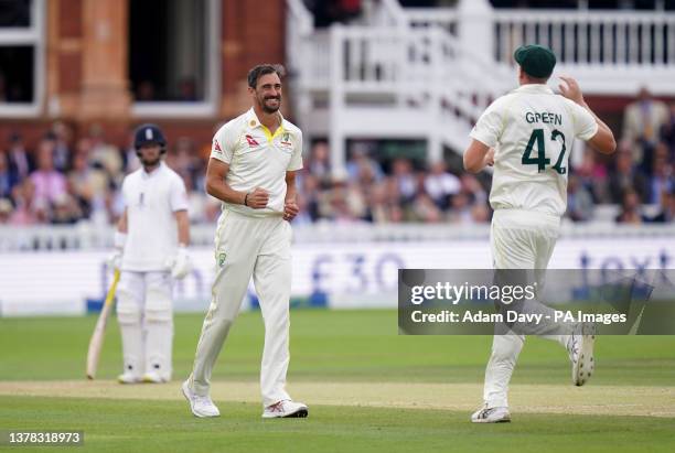 Australia's Mitchell Starc celebrates taking the wicket of England's Zak Crawley during day four of the second Ashes test match at Lord's, London....