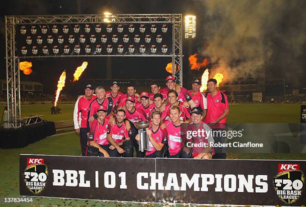 The Sixers celebrate after they won the T20 Big Bash League Grand Final match between the Perth Scorchers and the Sydney Sixers at WACA on January...