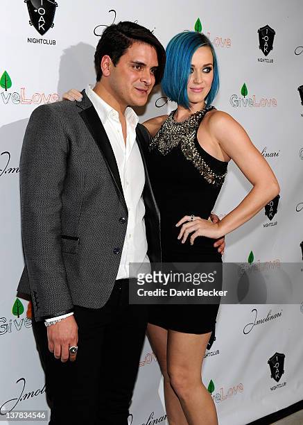 Markus Molinari and Katy Perry arrive at the 1 OAK Las Vegas grand opening at The Mirage Hotel & Casino on January 27, 2012 in Las Vegas, Nevada.