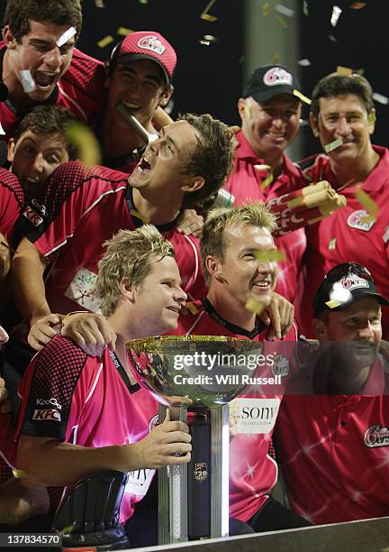 Steve Smith and the Sydney Sixers team celebrate with the trophy after the T20 Big Bash League Grand Final match between the Perth Scorchers and the...