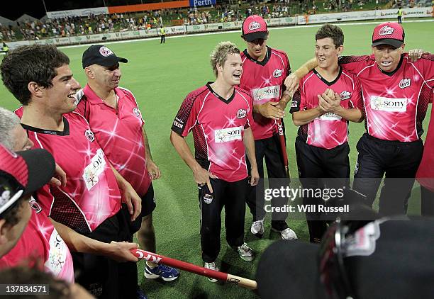 Sixers captain Steve Smith talks to the team after their win during the T20 Big Bash League Grand Final match between the Perth Scorchers and the...