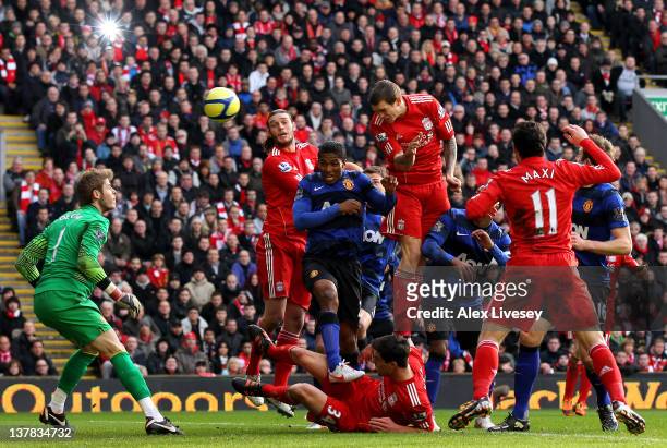 Daniel Agger of Liverpool scores the opening goal during the FA Cup Fourth Round match between Liverpool and Manchester United at Anfield on January...