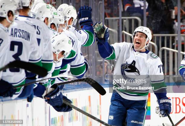 Brad Hunt of the Vancouver Canucks celebrates his second period goal against the New York Islanders at the UBS Arena on March 03, 2022 in Elmont, New...