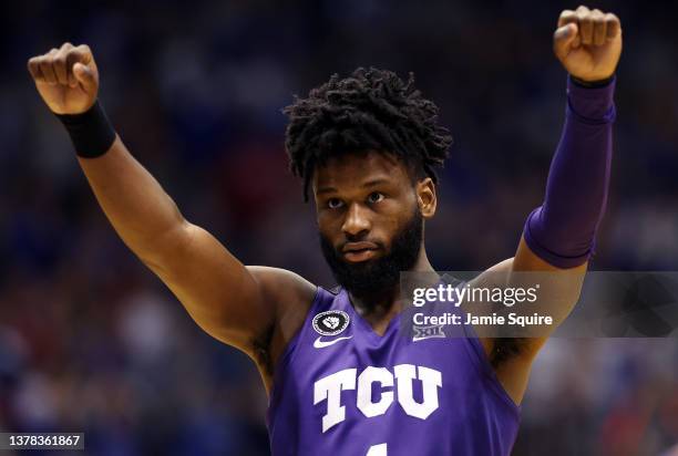 Mike Miles of the TCU Horned Frogs stretches prior to the start of the game against the Kansas Jayhawks at Allen Fieldhouse on March 03, 2022 in...