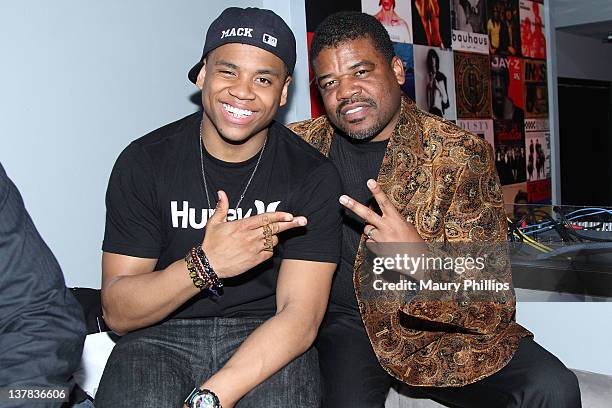 Actor Tristan Wilds and attorney Fred Dorton attend Lynn Jeter And Mario Singleton Birthday Celebration at Rolling Stone Restaurant & Lounge on...