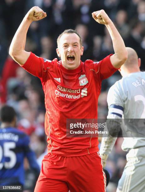 Charlie Adam of Liverpool celebrates at the final whistle during the FA Cup Fourth Round match between Liverpool and Manchester United at Anfield on...