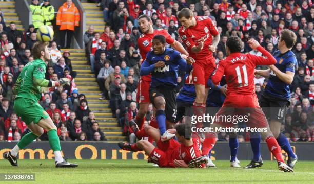 Daniel Agger of Liverpool scores their first goal during the FA Cup Fourth Round match between Liverpool and Manchester United at Anfield on January...