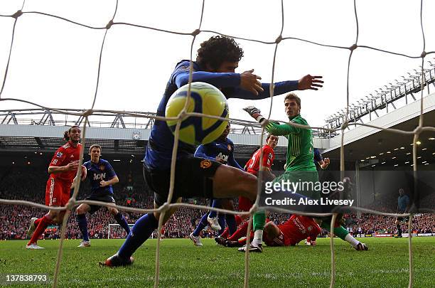 Rafael of Manchester United is unable to prevent Daniel Agger of Liverpool scoring the opening goal during the FA Cup Fourth Round match between...