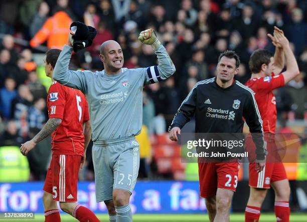 Pepe Reina celebrates at the end of the match with Liverpool teammates at the end of the FA Cup fourth round match between Liverpool and Manchester...