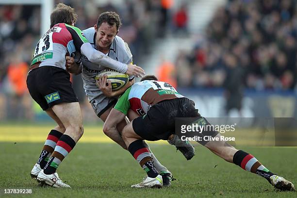 Dante Mama of Leicester Tigers is tackled by Ben Urdapilleta of Harlequins during the LV= Cup match between Harlequins and Leicester Tigers at...