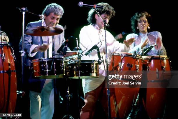 American percussionist Pete Escovedo with his son and daughter, American bongo player Juan Escovedo and American percussionist and singer Sheila E....