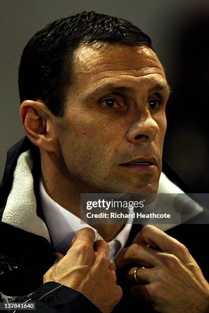 Gus Poyet the Brighton manager looks on during the FA Cup fourth round match between Brighton and Hove Albion and Newcastle United at Amex Stadium on...