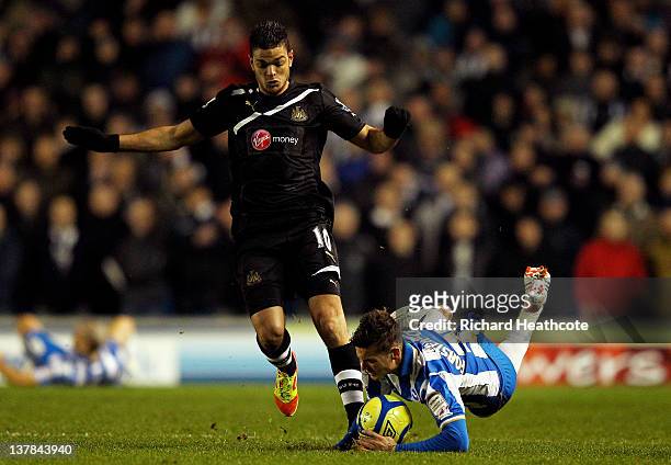 Jake Forster-Caskey of Brighton is brought down by Hatem Ben Arfa of Newcastle during the FA Cup fourth round match between Brighton and Hove Albion...