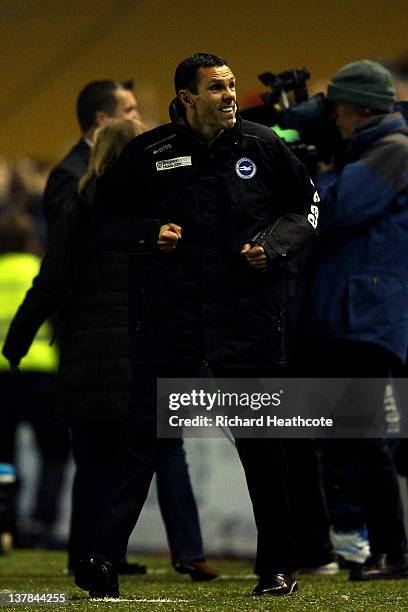 Gus Poyet the Brighton manager celebrates following his team's 1-0 victory during the FA Cup fourth round match between Brighton and Hove Albion and...