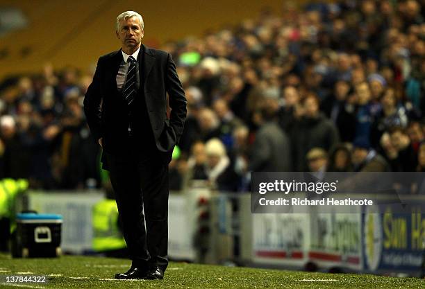 Alan Pardew the Newcastle manager looks on as his team head towards a 1-0 defeat during the FA Cup fourth round match between Brighton and Hove...