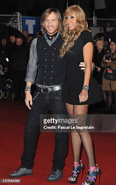 David and Cathy Guetta pose as they arrive at NRJ Music Awards 2012 at Palais des Festivals on January 28, 2012 in Cannes, France.