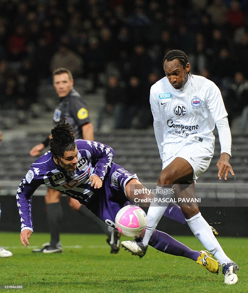 Emmanuel Riviere Toulouse's forward Emmanuel Riviere vies with Caen's defender Jeremy ...