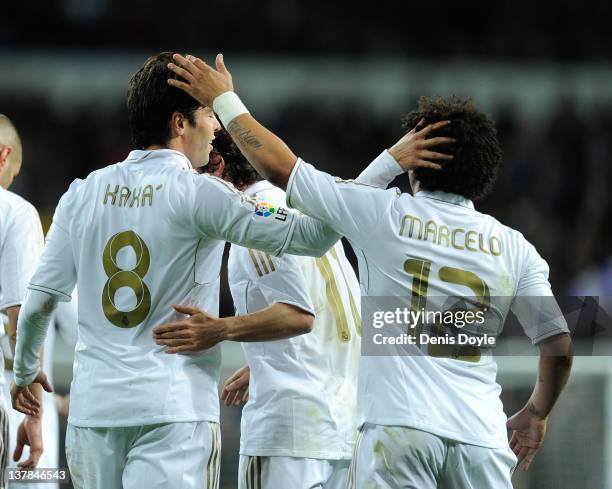 Kaka of Real Madrid celebrates with Marcelo after scoring Real's firstr goal during the La Liga match between Real Madrid and Real Zaragoza at...