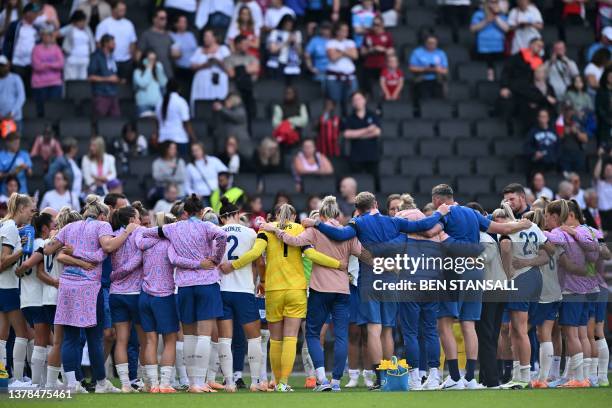 England players huddle following the International football friendly match between England and Portugal at the Stadium MK, in Milton Keynes, north of...