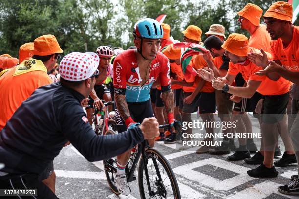 Lotto Dstny's Australian rider Caleb Ewan cycles in the ascent of the Col de Pike during the 1st stage of the 110th edition of the Tour de France...