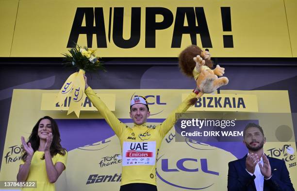 British Adam Yates of UAE Team Emirates wearing the yellow jersey of leader in the points ranking the first stage of the Tour de France cycling race,...