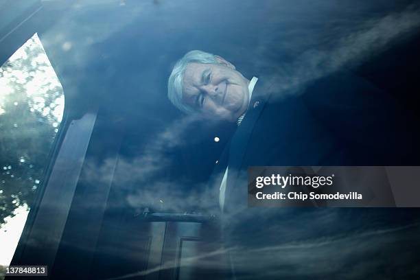 Republican presidential candidate and former Speaker of the House Newt Gingrich jokes with photographers as he steps off his campaign bus for a...
