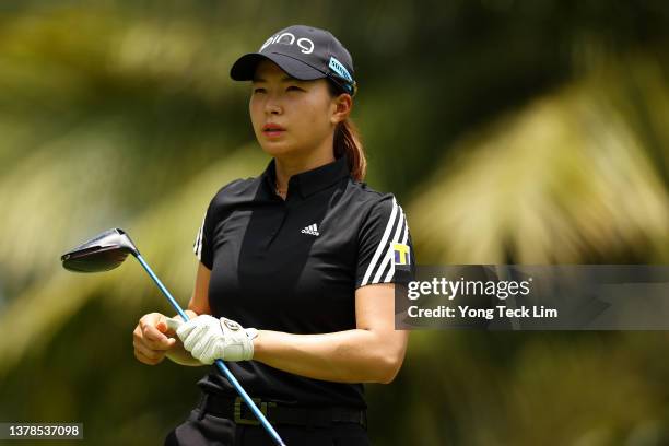 Hinako Shibuno of Japan reacts after playing her shot from the second tee during the second round of the HSBC Women's World Championship at Sentosa...