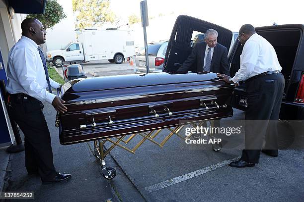 Etta James' coffin arrives at her funeral In Gardena, California, on January 28, 2012. AFP PHOTO/VALERIE MACON