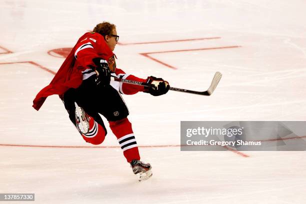 Patrick Kane of the Chicago Blackhawks and Team Chara takes against Team Alfredsson shot during the AllState Insureance NHL Breakaway Challenge part...