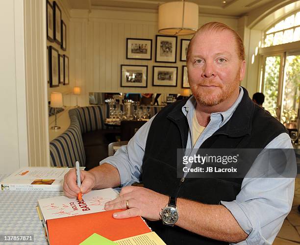 Mario Batali signs copies of his new Cookbook "Molto Batali: Simple Family Meals From My Home To Yours" at Shutters On The Beach on January 28, 2012...