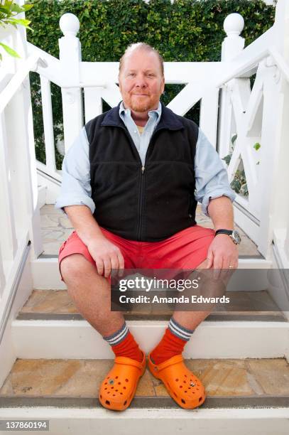 Chef Mario Batali poses before signing copies of his cookbook "Molto Batali: Simple Family Meals From My Home To Yours" at Shutters On The Beach on...