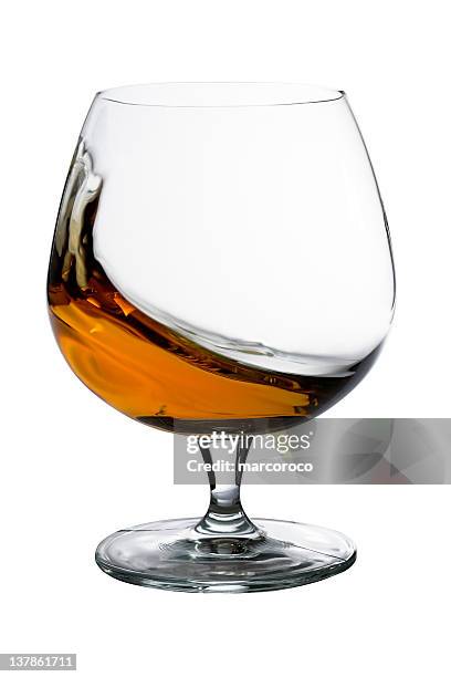 brandy-cogniac ich in motion - cognac glass stock-fotos und bilder