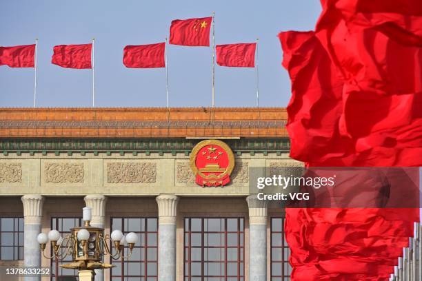 Red flags flutter in front of the Great Hall of the People before the annual two sessions on March 4, 2022 in Beijing, China. The fifth session of...