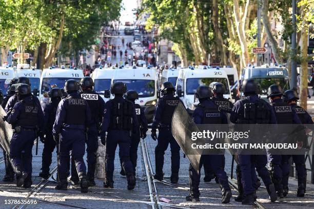 Police officers walk during a demonstration against police in Marseille, southern France on July 1 after a fourth consecutive night of rioting in...